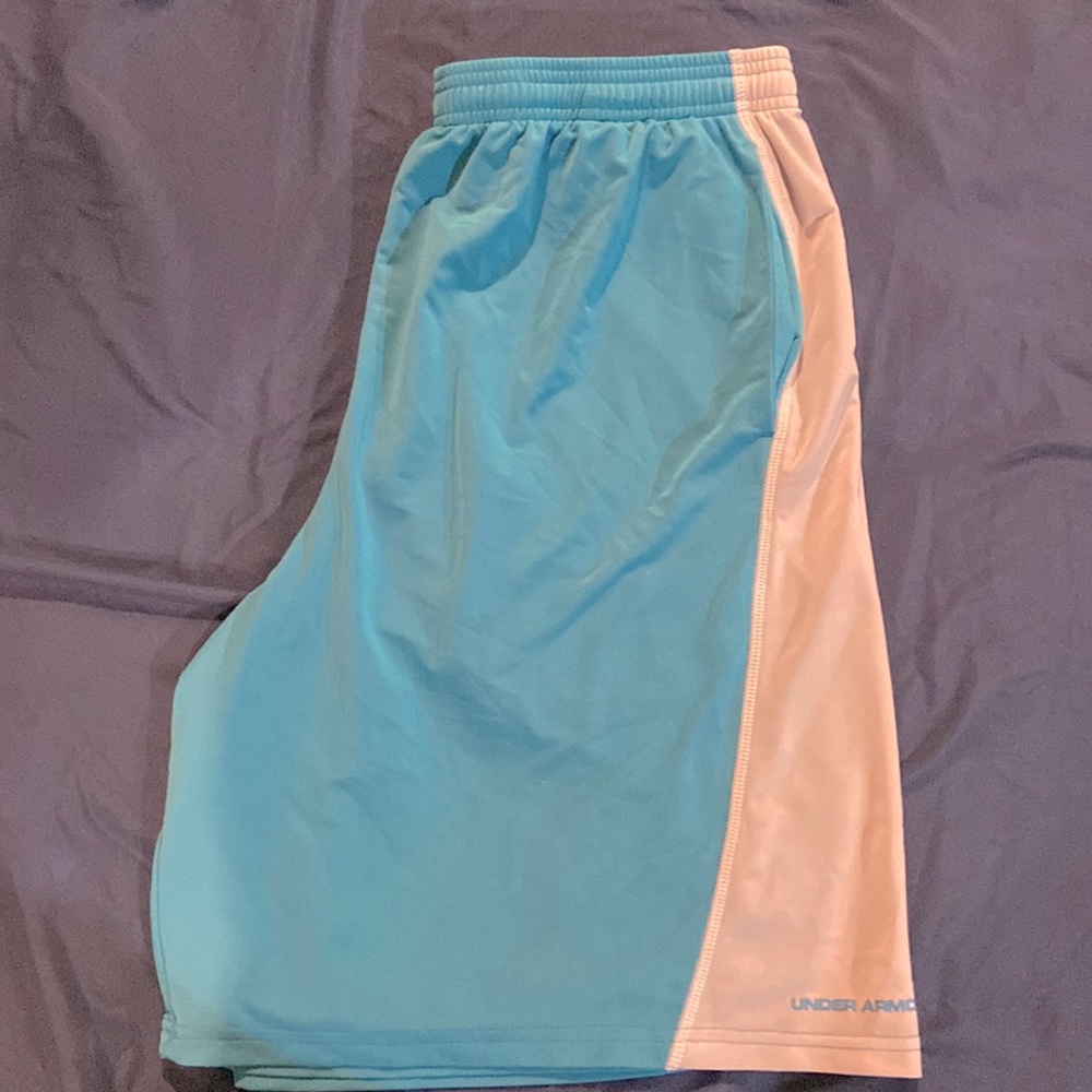 Under armour athletic shorts. Size large with a cool teal color